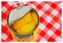 canned yellow peach in syrup - product's photo