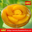 canned yellow peach slices - product's photo