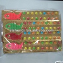 chocolate beans with a music fish toy candy - product's photo